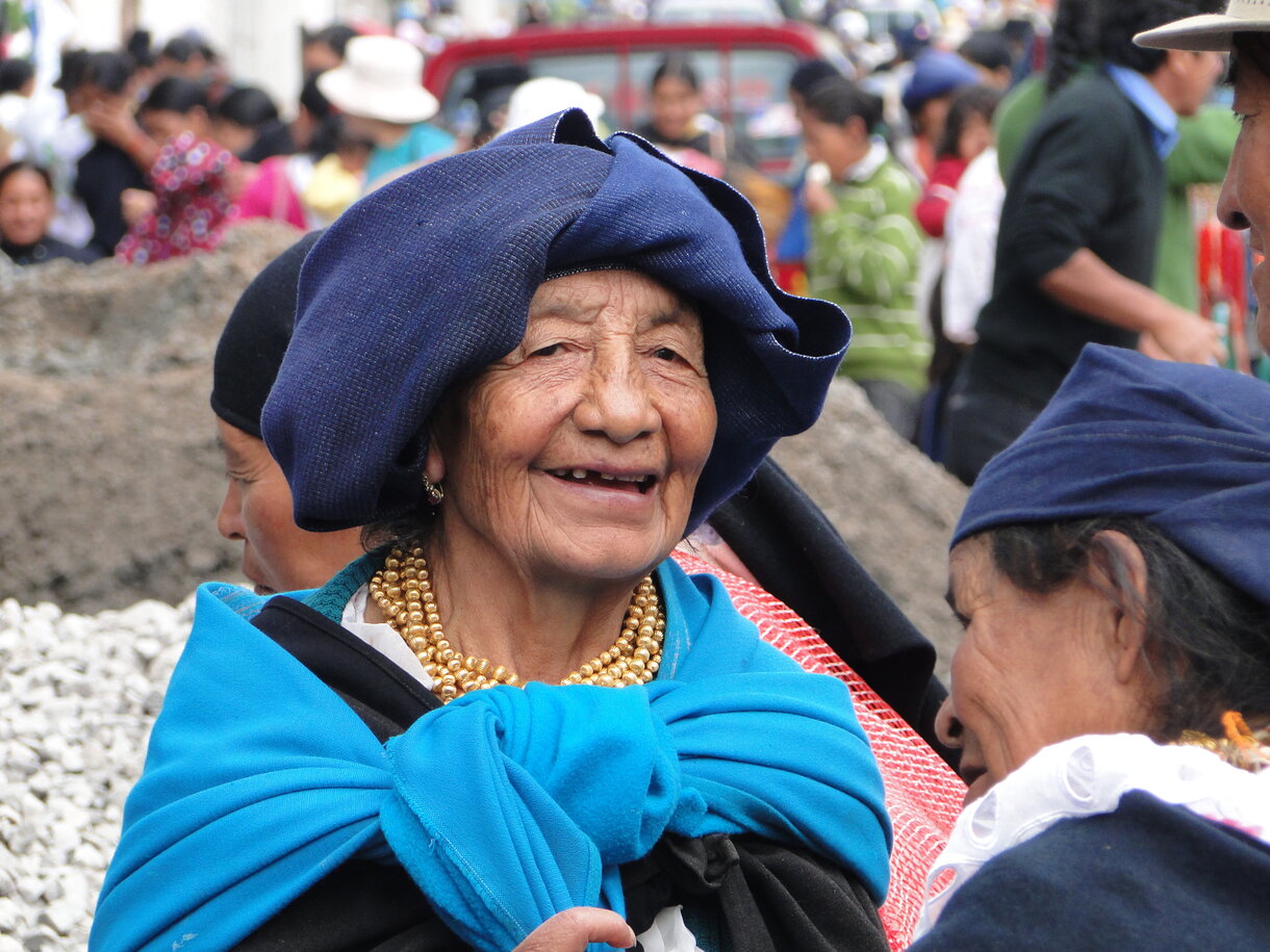 Traditionally dressed lady in the market of Otovalo